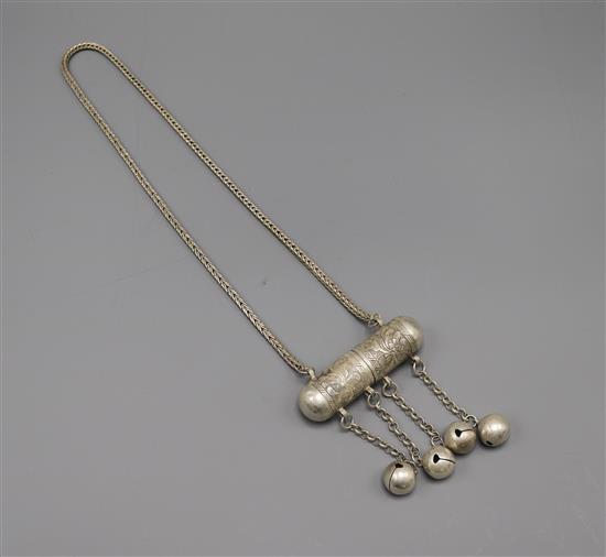 A white metal Chinese chain and pendant